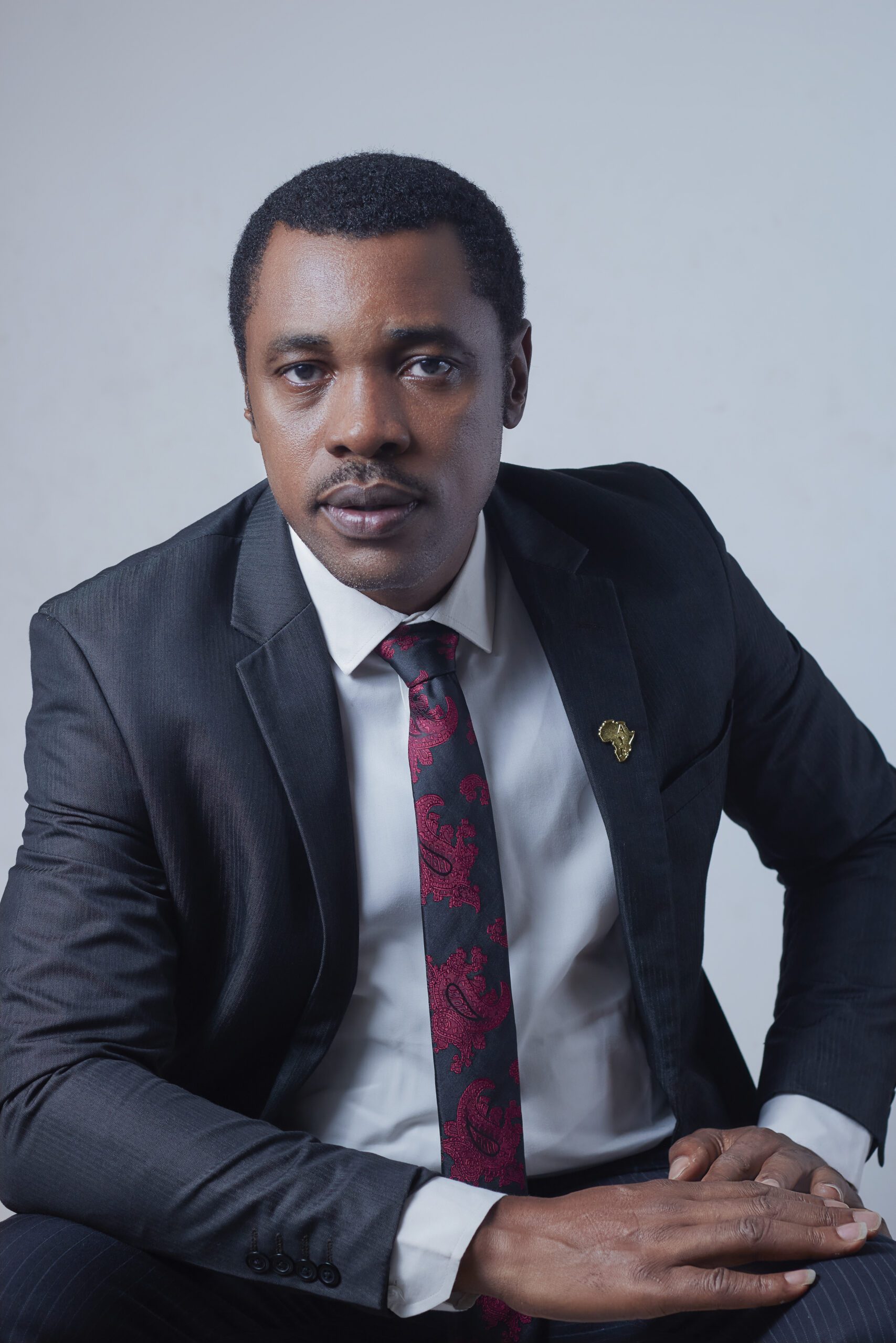 KIGBA corporate headshot